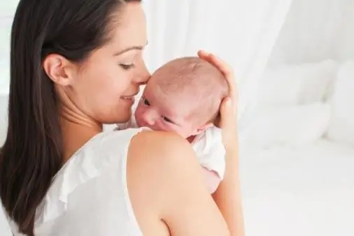 How to hold your baby after feeding